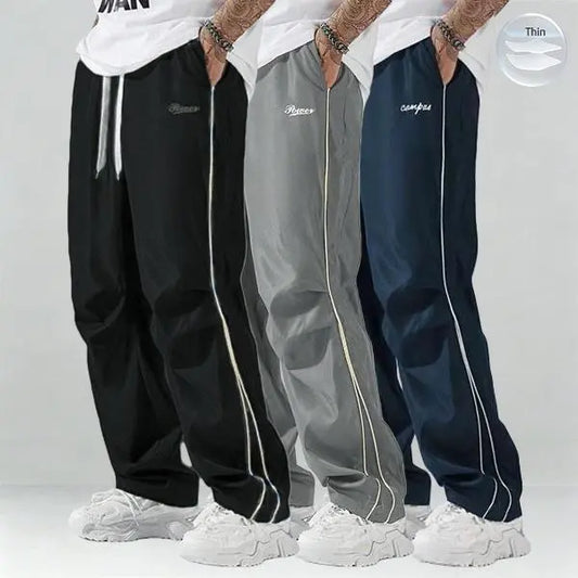 Father’s Day Gift Men’s Spring/Autumn Pants Set (1–3 pieces) | Lightweight & Soft | Side Gold Stripes | Loose Straight Fit | Street Style / Fitness / Casual Vibe | Black/Gray + Multiple Colors